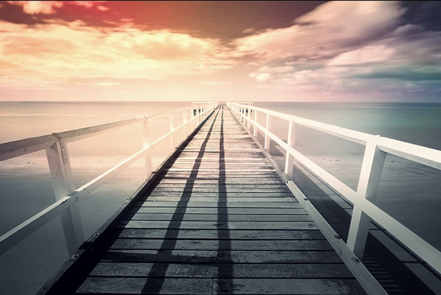 pier facing sunset