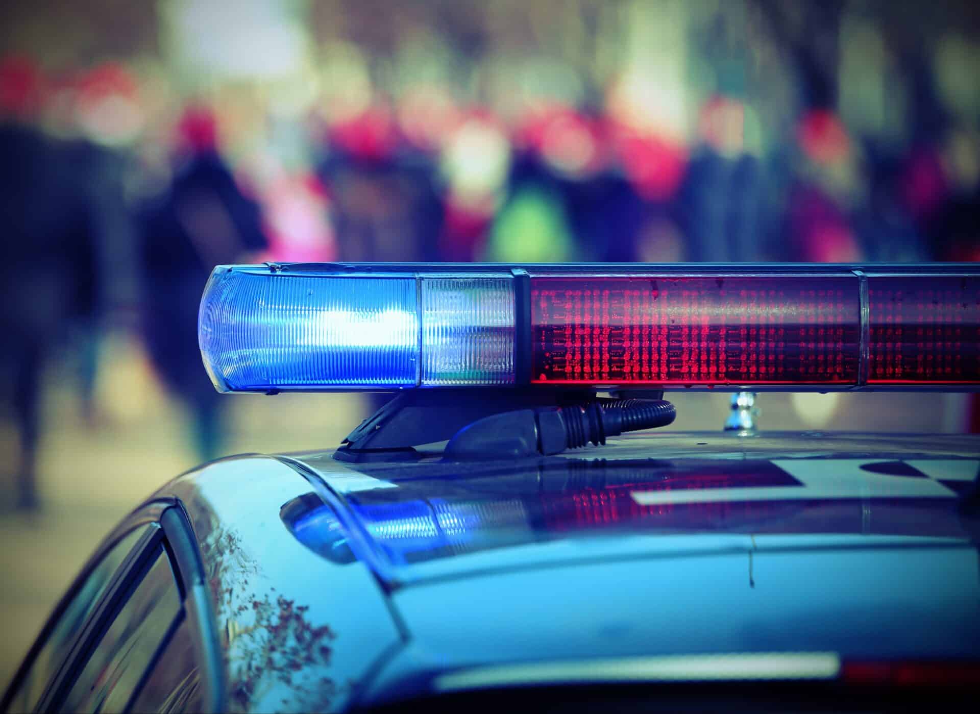 Police car with lights of sirens with vintage effect